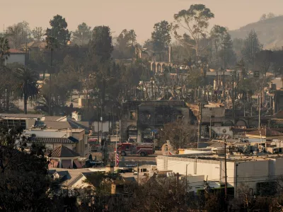 Fire engines drive on Sunset Boulevard during the Palisades Fire in the Pacific Palisades neighborhood, in Los Angeles, California, U.S. January 10, 2025. REUTERS/David Ryder