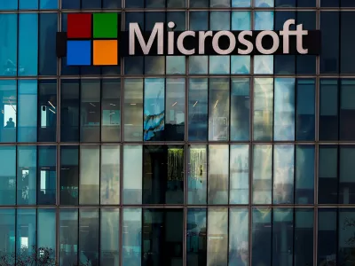 A view shows a Microsoft logo at Microsoft offices in Issy-les-Moulineaux near Paris, France, January 9, 2025. REUTERS/Gonzalo Fuentes