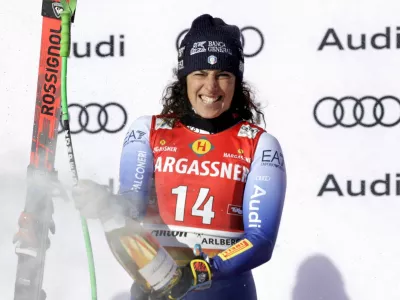 Alpine Skiing - FIS Alpine Ski World Cup - Women's Downhill - St. Anton, Austria - January 11, 2025 Italy's Federica Brignone celebrates on the podium after winning the Women's Downhill REUTERS/Leonhard Foeger