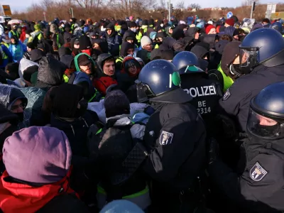 Protesters block a road during a demonstration, near the venue for the far-right Alternative for Germany (AfD) party congress in Riesa, Germany, January 11, 2025. REUTERS/Thilo Schmuelgen