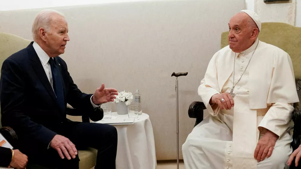 FILE PHOTO: U.S. President Joe Biden meets with Pope Francis on the second day of the G7 summit at the Borgo Egnazia resort, in Savelletri, Puglia, Italy, June 14, 2024. REUTERS/Kevin Lamarque/Pool/File Photo