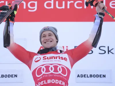 The winner Switzerland's Marco Odermatt celebrates after an alpine ski, men's World Cup giant slalom race, in Adelboden, Switzerland, Sunday, Jan. 12, 2025. (AP Photo/Giovanni Zenoni)