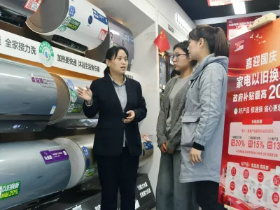 Consumers buy water heaters at an appliance trade-in promotion event in Handan, China, on October 7, 2024. (Photo by Costfoto/NurPhoto)NO USE FRANCE