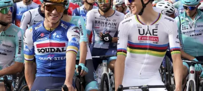 Belgium's Remco Evenepoel, left, and Slovenia's Tadej Pogacar prepare to start the Il Lombardia cycling race in Bergamo, Italy, Saturday, Oct. 12, 2024. (Gian Mattia D'Alberto/LaPresse via AP)