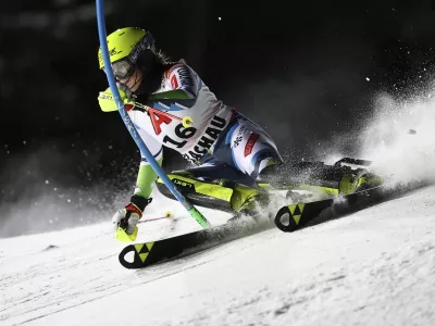 Slovenia's Neja Dvornik speeds down the course during an alpine ski, women's World Cup slalom in Flachau, Austria, Tuesday, Jan.14, 2025. (AP Photo/Marco Trovati)