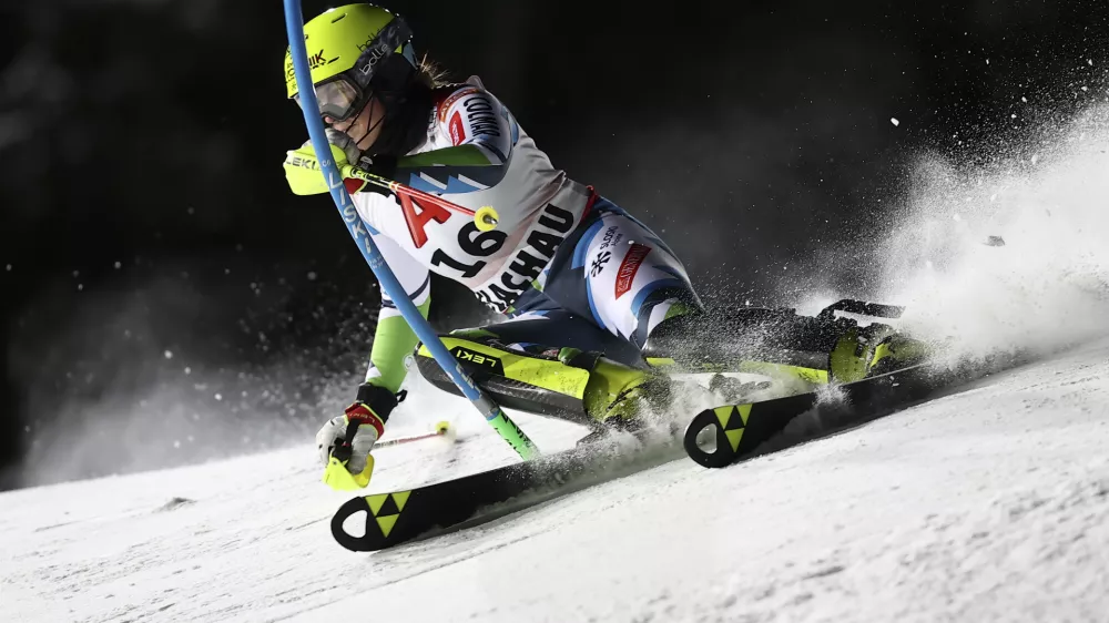 Slovenia's Neja Dvornik speeds down the course during an alpine ski, women's World Cup slalom in Flachau, Austria, Tuesday, Jan.14, 2025. (AP Photo/Marco Trovati)