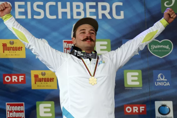 ﻿Slovenia's Filip Flisar celebrates his gold medal at the men's freestyle ski cross event at the Freestyle Ski and Snowboard World Championships in Kreischberg, Austria, Sunday, Jan. 25, 2015. (AP Photo/Darko Bandic)