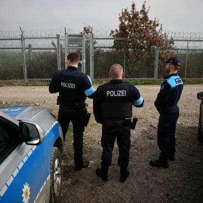 Frontex border police from Germany and Greece are pictured near a fence at the border between Bulgaria and Turkey, near Kapitan Andreevo, Bulgaria, February 29, 2024. REUTERS/Stoyan Nenov