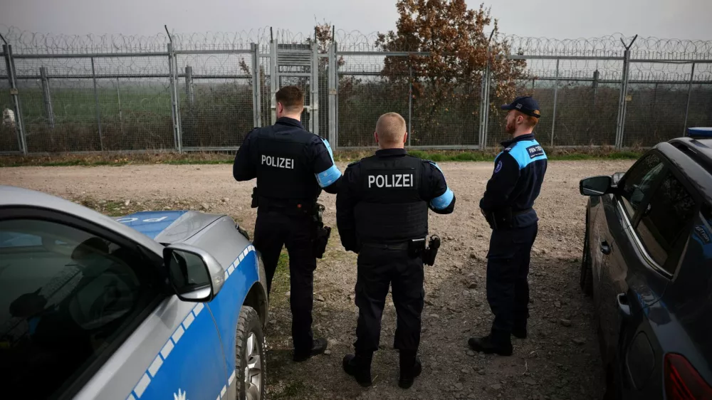 Frontex border police from Germany and Greece are pictured near a fence at the border between Bulgaria and Turkey, near Kapitan Andreevo, Bulgaria, February 29, 2024. REUTERS/Stoyan Nenov