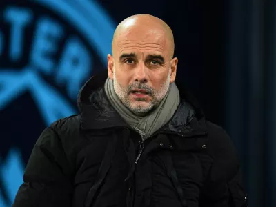 FILE PHOTO: Soccer Football - FA Cup - Third Round - Manchester City v Salford City - Etihad Stadium, Manchester, Britain - January 11, 2025 Manchester City manager Pep Guardiola before the match REUTERS/Peter Powell/File Photo