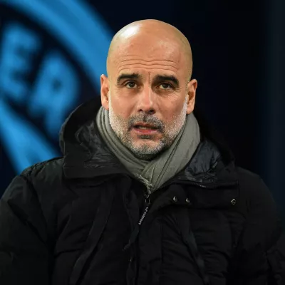 FILE PHOTO: Soccer Football - FA Cup - Third Round - Manchester City v Salford City - Etihad Stadium, Manchester, Britain - January 11, 2025 Manchester City manager Pep Guardiola before the match REUTERS/Peter Powell/File Photo