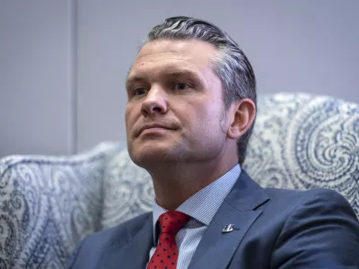 FILE - Pete Hegseth, President-elect Donald Trump's nominee to be defense secretary, responds to reporters during a meeting with Sen. Mike Rounds, R-S.D., a member of the Senate Armed Services Committee, at the Capitol in Washington, Dec. 5, 2024. (AP Photo/J. Scott Applewhite, File)