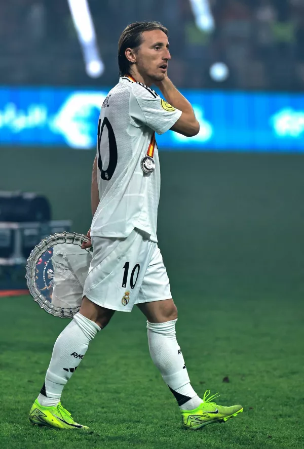 Soccer Football - Spanish Super Cup - Final - FC Barcelona v Real Madrid - King Abdullah Sports City, Jeddah, Saudi Arabia - January 12, 2025 Real Madrid's Luka Modric looks dejected during the trophy presentation after losing the Spanish Super Cup final REUTERS/Stringer