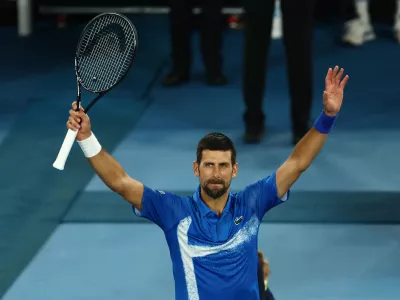 Tennis - Australian Open - Melbourne Park, Melbourne, Australia - January 15, 2025 Serbia's Novak Djokovic celebrates winning his second round match against Portugal's Jaime Faria REUTERS/Edgar Su