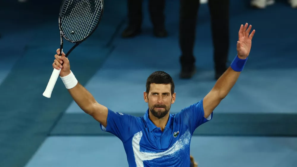 Tennis - Australian Open - Melbourne Park, Melbourne, Australia - January 15, 2025 Serbia's Novak Djokovic celebrates winning his second round match against Portugal's Jaime Faria REUTERS/Edgar Su