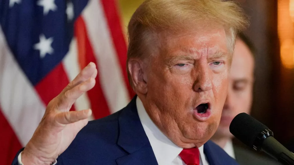 FILE PHOTO: Republican presidential nominee and former U.S. President Donald Trump gestures as he speaks during a press conference at Trump Tower in New York City, U.S., September 6, 2024. REUTERS/David Dee Delgado//File Photo