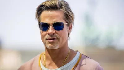 FILED - 19 July 2022, Berlin: US actor Brad Pitt attends a photocall on the occasion of the German premiere of the feature film "Bullet Train" on a terrace of the Academy of Arts near the Brandenburg Gate. Photo: Christoph Soeder/dpa