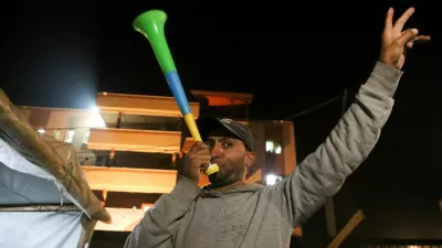 A Palestinian man reacts to news on a ceasefire deal with Israel, in Khan Younis in the southern Gaza Strip, January 15, 2025. REUTERS/Hatem Khaled REFILE - CORRECTING LOCATION FROM "DEIR AL-BALAH" TO "KHAN YOUNIS".