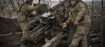 FILE - Ukrainian soldiers of the 71st Jaeger Brigade fire a M101 howitzer towards Russian positions at the frontline, near Avdiivka, Donetsk region, Ukraine, Friday, March 22, 2024. Much of what NATO can do for Ukraine, and indeed for global security, is misunderstood. Often in the public mind, the alliance is thought of as the sum of all U.S. relations with its European partners, from imposing sanctions and other costs on Russia to sending arms and ammunition. But as an organization its brief is limited to the defense by military means of its 32 member countries and a commitment to help keep the peace in Europe and North America. (AP Photo/Efrem Lukatsky, File)