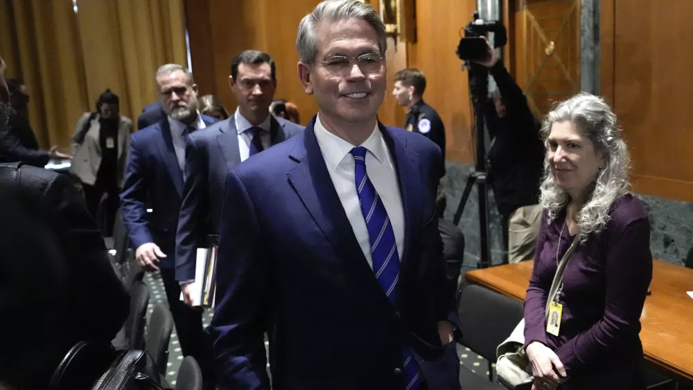 Scott Bessent, President-elect Donald Trump's choice to be Secretary of the Treasury, leaves after the Senate Finance Committee for his confirmation hearing, at the Capitol in Washington, Thursday, Jan. 16, 2025. (AP Photo/Ben Curtis)