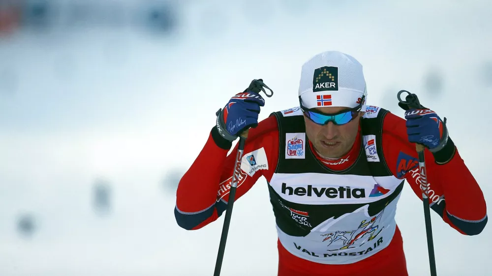 Petter Northug jr. of Norway reacts after missing to qualify for the final of the World Cup men's cross country sprint race in Tschierv January 1, 2013. REUTERS/ Dominic Ebenbichler (SWIT ZERLAND - Tags: SPORT SKIING)