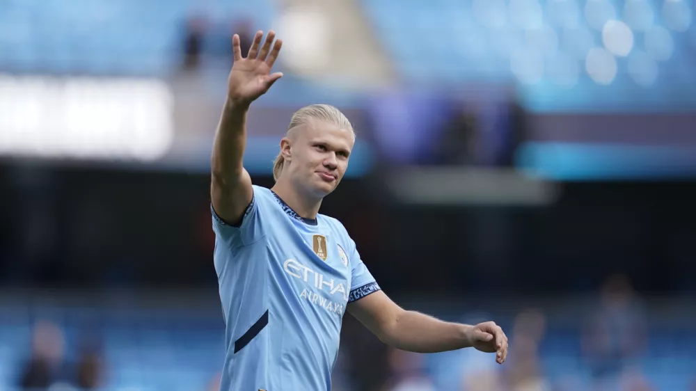 FILE -Manchester City's Erling Haaland waves fans after the English Premier League soccer match between Manchester City and Ipswich Town at the Etihad Stadium in Manchester, England, Aug. 24, 2024. (AP Photo/Dave Thompson, File)