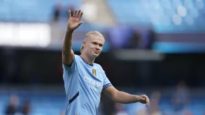 FILE -Manchester City's Erling Haaland waves fans after the English Premier League soccer match between Manchester City and Ipswich Town at the Etihad Stadium in Manchester, England, Aug. 24, 2024. (AP Photo/Dave Thompson, File)