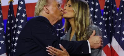 Republican presidential nominee and former U.S. President Donald Trump takes the stage with his wife Melania to address supporters at his rally, at the Palm Beach County Convention Center in West Palm Beach, Florida, U.S., November 6, 2024. REUTERS/Brian Snyder