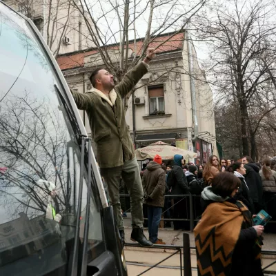 Protestors chant as they march during a demonstration against corruption and demanding justice for those killed when a train station roof collapsed in November, in Belgrade, on January 16, 2025. Thousands of Serbians took to the streets of the capital Belgrade in ongoing protests since a roof in a train station in the northern city of Novi Sad, collapsed on November 1, 2024, and killed 15 people.,Image: 954238697, License: Rights-managed, Restrictions:, Model Release: no