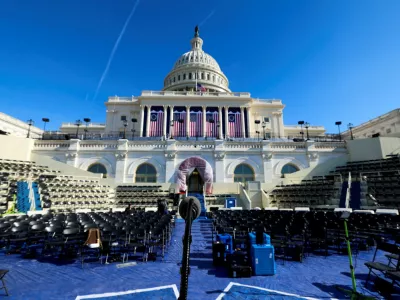 Empty chairs on the inaugural stand are seen on the day it was announced U.S. President-elect Donald Trump's inauguration is being moved indoors due to dangerously cold temperatures expected on Monday, in Washington, U.S., January 17, 2025. REUTERS/Kevin Lamarque