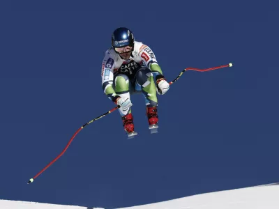 Slovenia's Miha Hrobat speeds down the course during an alpine ski, men's World Cup downhill, in Wengen, Switzerland, Saturday, Jan. 18, 2025 (AP Photo/Gabriele Facciotti)