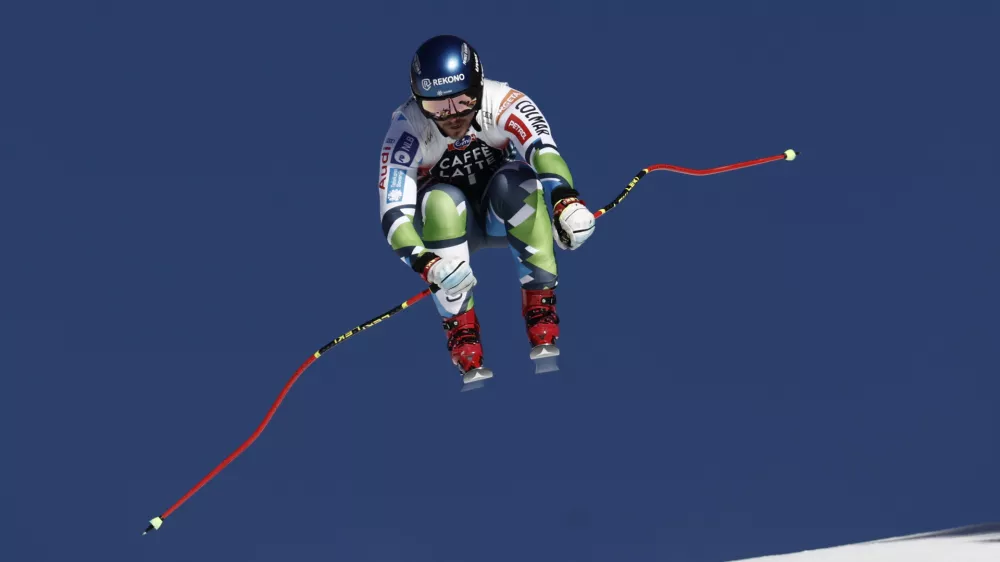 Slovenia's Miha Hrobat speeds down the course during an alpine ski, men's World Cup downhill, in Wengen, Switzerland, Saturday, Jan. 18, 2025 (AP Photo/Gabriele Facciotti)