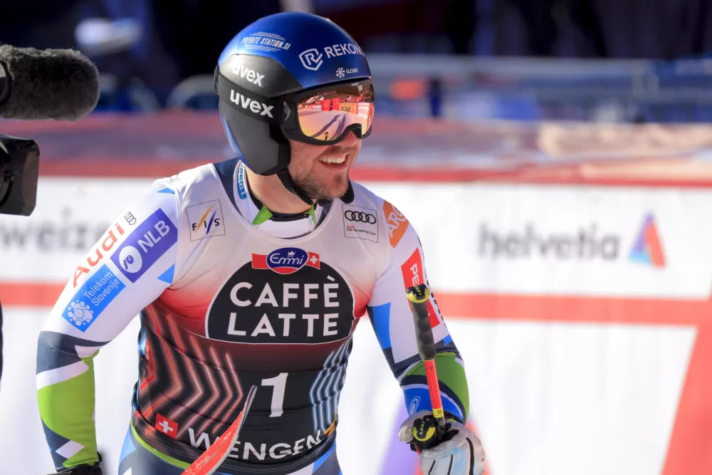 Slovenia's Miha Hrobat celebrates at the finish area of an alpine ski, men's World Cup downhill, in Wengen, Switzerland, Saturday, Jan. 18, 2025 (AP Photo/Giovanni Maria Pizzato)