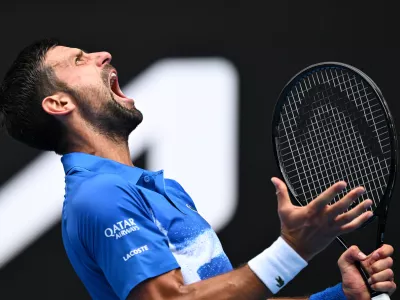 FILED - 15 January 2025, Australia, Melbourne: Serbian tennis player Novak Djokovic reacts during his round 2 match against Portugese tennis player Jaime Faria during the 2025 Australian Open at Melbourne Park in Melbourne. Photo: Lukas Coch/AAP/dpa