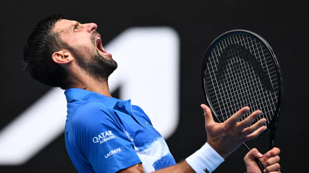 FILED - 15 January 2025, Australia, Melbourne: Serbian tennis player Novak Djokovic reacts during his round 2 match against Portugese tennis player Jaime Faria during the 2025 Australian Open at Melbourne Park in Melbourne. Photo: Lukas Coch/AAP/dpa