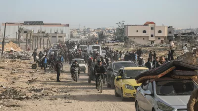 19 January 2025, Palestinian Territories, Rafah: Displaced Palestinians travel in vehicles past rubble, as they attempt to return to their homes, in Rafah, in the southern Gaza Strip. A newly brokered ceasefire between Israel and Hamas in the Gaza Strip took effect on 19 January. Photo: Omar Ashtawy/APA Images via ZUMA Press Wire/dpa