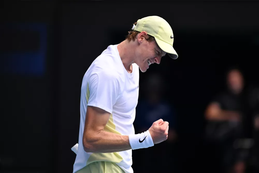 20 January 2025, Australia, Melbourne: Italian tennis player Jannik Sinner reacts during his round 4 match against Danish tennis player Holger Rune during the 2025 Australian Open at Melbourne Park. Photo: James Ross/AAP/dpa