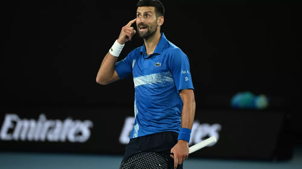 19 January 2025, Australia, Melbourne: Serbian tennis player Novak Djokovic reacts during his round four match against Czech tennis player Jiri Lehecka during the 2025 Australian Open at Melbourne Park. Photo: James Ross/AAP/dpa