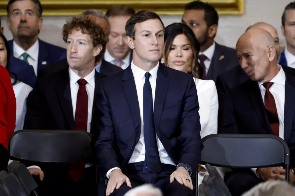 Jared Kusner (C) and Meta CEO Mark Zuckerberg (L) attend Donald Trump's inauguration as the next President of the United States in the rotunda of the United States Capitol in Washington, DC, USA, 20 January 2025. Trump, who defeated Kamala Harris, is being sworn in today as the 47th president of the United States, though the planned outdoor ceremonies and events have been cancelled due to a forecast of extreme cold temperatures. SHAWN THEW/Pool via REUTERS