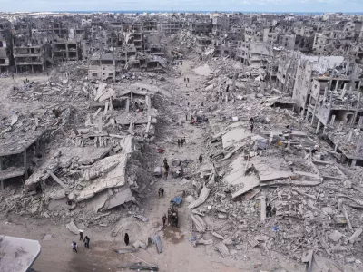 An aerial photograph taken by a drone shows displaced Palestinians returning to Rafah, a day after the ceasefire deal between Israel and Hamas came into effect, Gaza Strip, Monday, Jan. 20, 2025. (AP Photo/Mohammad Abu Samra)