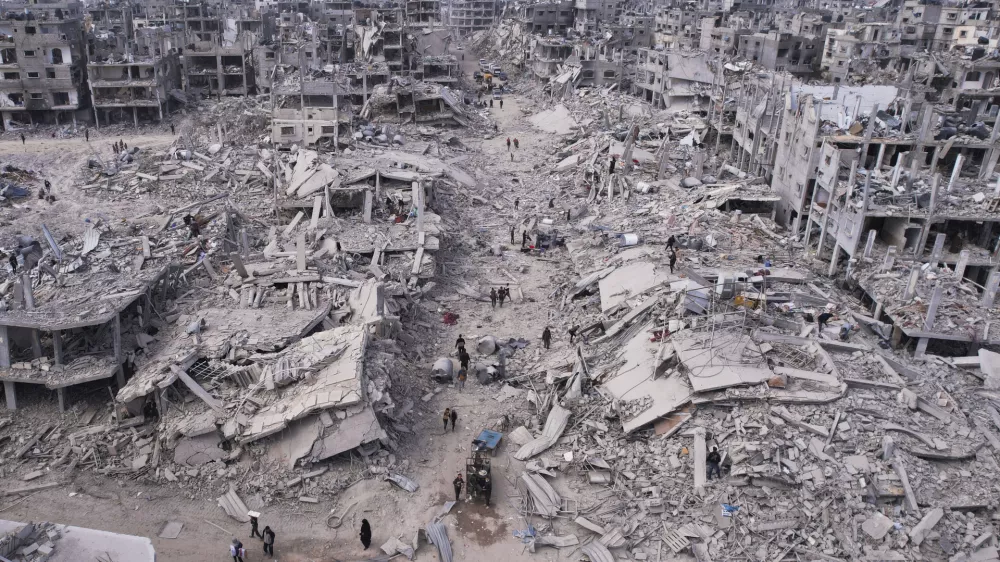 An aerial photograph taken by a drone shows displaced Palestinians returning to Rafah, a day after the ceasefire deal between Israel and Hamas came into effect, Gaza Strip, Monday, Jan. 20, 2025. (AP Photo/Mohammad Abu Samra)