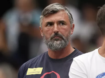 FILE- Goran Ivanisevic watches the men's singles semifinal match between Italy's Jannik Sinner and Serbia's Novak Djokovic on day twelve of the Wimbledon tennis championships in London, Friday, July 14, 2023. (AP Photo/Alberto Pezzali,File)