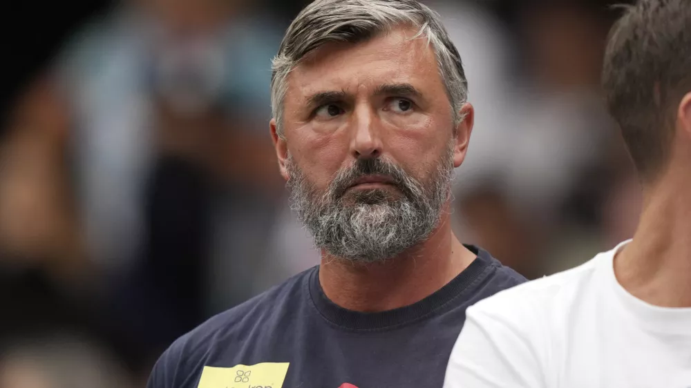 FILE- Goran Ivanisevic watches the men's singles semifinal match between Italy's Jannik Sinner and Serbia's Novak Djokovic on day twelve of the Wimbledon tennis championships in London, Friday, July 14, 2023. (AP Photo/Alberto Pezzali,File)