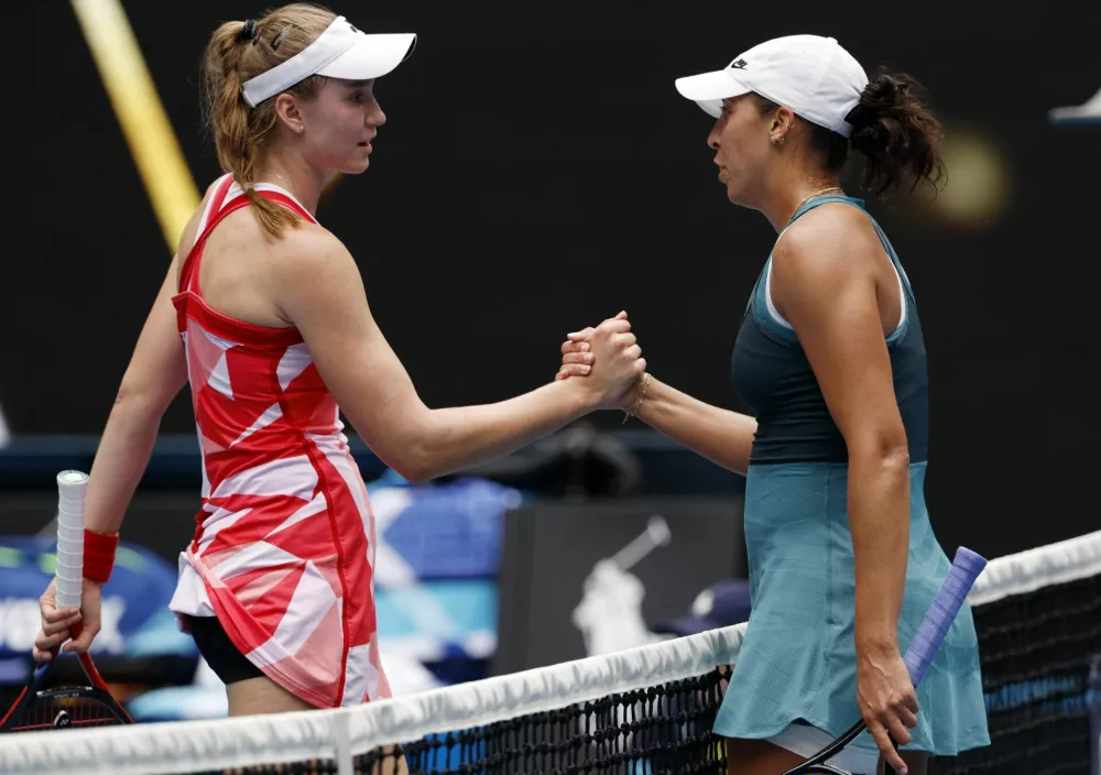 Tennis - Australian Open - Melbourne Park, Melbourne, Australia - January 20, 2025 Madison Keys of the U.S. shakes hands with Kazakhstan's Elena Rybakina after winning her fourth round match REUTERS/Kim Kyung-Hoon