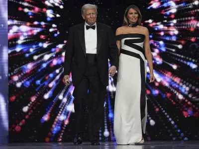 President Donald Trump and first lady Melania Trump arrive at the Liberty Ball, part of the 60th Presidential Inauguration, Monday, Jan. 20, 2025, in Washington. (AP Photo/Evan Vucci)