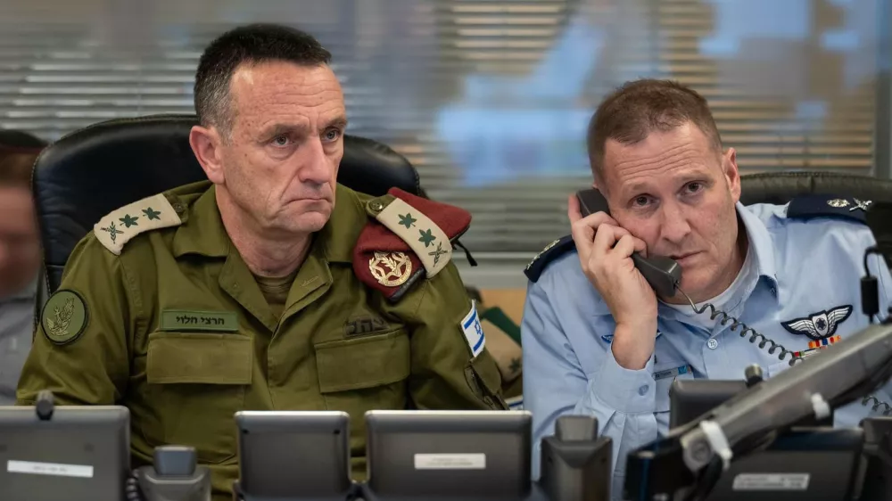 FILED - 26 October 2024, Israel, Tel Aviv: Chief of Israeli General Staff Herzi Halevi (L) and Commander of the Israeli Air Force Tomer Bar sit in an underground command center of the Israeli Air Force at Camp Rabin (Kirya) directing an attack on Iran. Israeli Chief of the General Staff Herzi Halevi has resigned, citing failures by the Israeli military regarding the Hamas-led October 7 attacks, a military spokesman said on Tuesday. Photo: -/IDF/X/dpa - ACHTUNG: Nur zur redaktionellen Verwendung und nur mit vollständiger Nennung des vorstehenden Credits