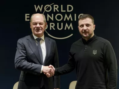 German Chancellor Olaf Scholz, left, and Ukrainian President Volodymyr Zelenskyy meet at the Annual Meeting of World Economic Forum in Davos, Switzerland, Tuesday, Jan. 21, 2025. (AP Photo/Markus Schreiber, Pool)