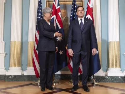 Australia's Foreign Minister Penny Wong, left, waits to shake hands with Secretary of State Marco Rubio, at the State Department, Tuesday, Jan. 21, 2025, in Washington. (AP Photo/Jacquelyn Martin)