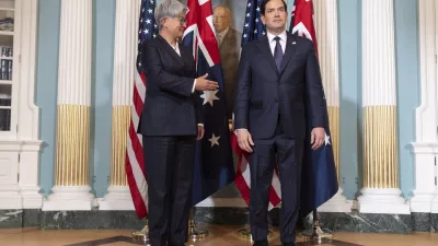 Australia's Foreign Minister Penny Wong, left, waits to shake hands with Secretary of State Marco Rubio, at the State Department, Tuesday, Jan. 21, 2025, in Washington. (AP Photo/Jacquelyn Martin)