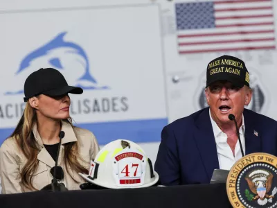 U.S. President Donald Trump and first lady Melania Trump attend a briefing on wildfire damage as they visit the Pacific Palisades neighborhood that was damaged by the Palisades Fire, in Los Angeles, California, U.S., January 24, 2025. REUTERS/Leah Millis